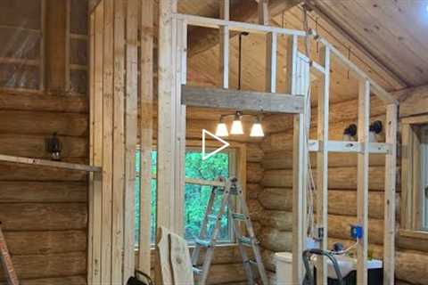 Log Cabin Build, Part 27. Framing interior walls, allowance for settling. Bathroom construction