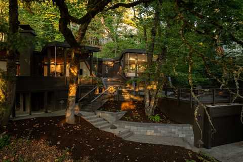 Massive Windows Fill This $1.1M Oregon Midcentury With Forest Views