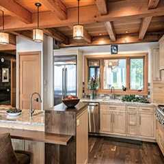 Creating Warm Interiors in Timber Frame Houses with Stylish Kitchen Cabinets